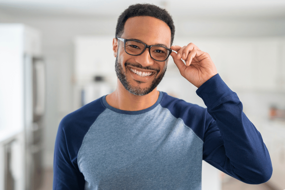 man smiling and wearing glasses with Neurolenses