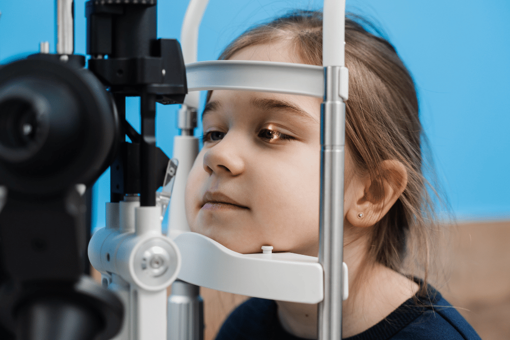 a little girl getting an eye exam